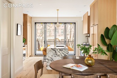 Originally built in 1899, this fully renovated single-family - photo 3