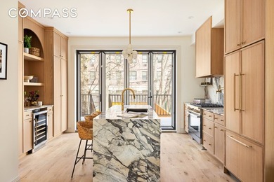 Originally built in 1899, this fully renovated single-family - photo 4