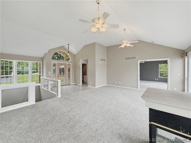 Perched on a bluff in the heart of Osage Beach, this one-owner - photo 5