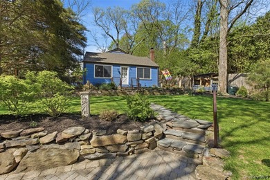Set in the heart of Stony Brook Village, this charming two - photo 1
