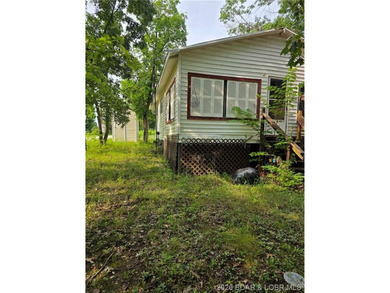 Cozy Lake-Area Home with Enclosed Porch & Bonus Shed Nestled - photo 3