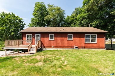 Welcome home to this bright and inviting 3-bedroom, 2-full-bath - photo 3