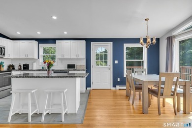 Welcome home to this bright and inviting 3-bedroom, 2-full-bath - photo 9
