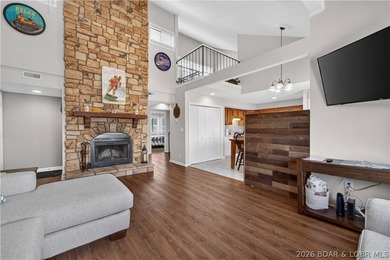 Top-floor condo living in the heart of Osage Beach! Located in - photo 1