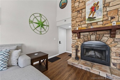 Top-floor condo living in the heart of Osage Beach! Located in - photo 2