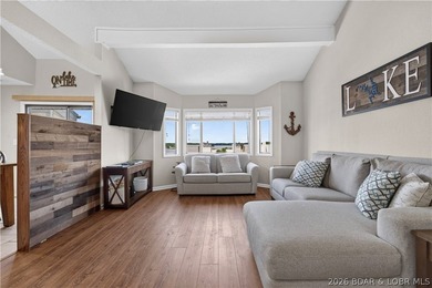 Top-floor condo living in the heart of Osage Beach! Located in - photo 3