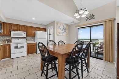Top-floor condo living in the heart of Osage Beach! Located in - photo 8
