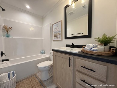 Welcome to this stunning brand-new three-bedroom, two-bath home - photo 8