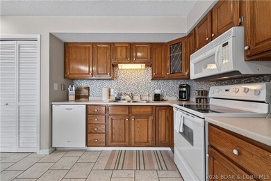 Top-floor condo living in the heart of Osage Beach! Located in - photo 10