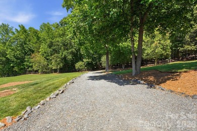 Welcome to a landmark Lake Wylie waterfront estate offering an - photo 10