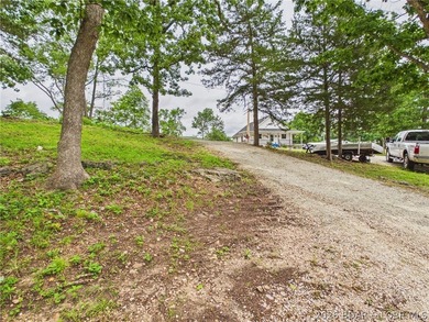 Don't miss this exceptional 4-bedroom, 2-bath lakefront home - photo 2