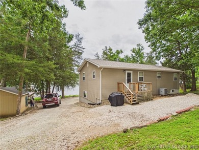 Don't miss this exceptional 4-bedroom, 2-bath lakefront home - photo 4