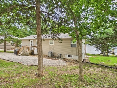 Don't miss this exceptional 4-bedroom, 2-bath lakefront home - photo 5