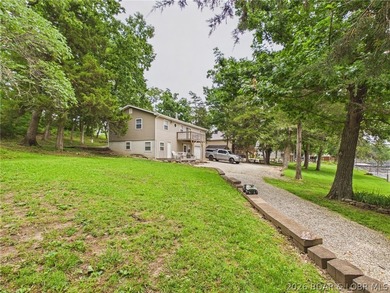 Don't miss this exceptional 4-bedroom, 2-bath lakefront home - photo 10
