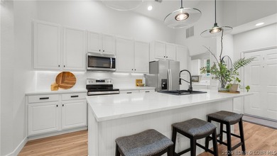Completely remodeled, fully furnished, and truly turnkey, this - photo 2