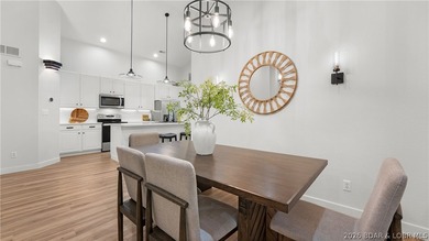 Completely remodeled, fully furnished, and truly turnkey, this - photo 9