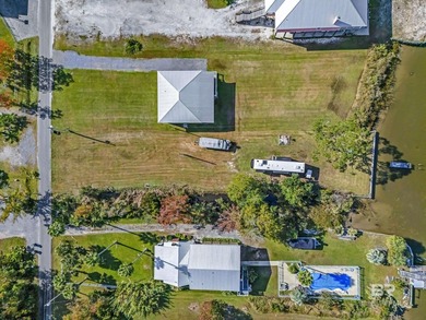IMPROVED PRICE! This waterfront lot offers the best of either - photo 8