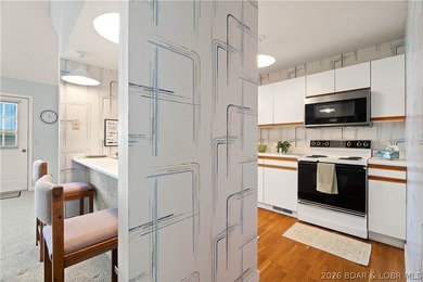 Turn-key lake living with an unbeatable location by both land - photo 10