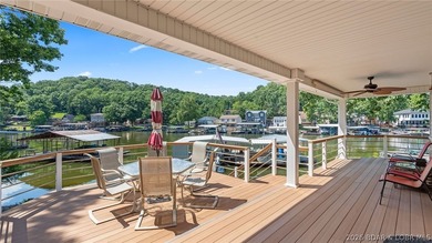 Designed with gathering in mind, this unique lake home was - photo 2