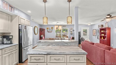 Designed with gathering in mind, this unique lake home was - photo 4
