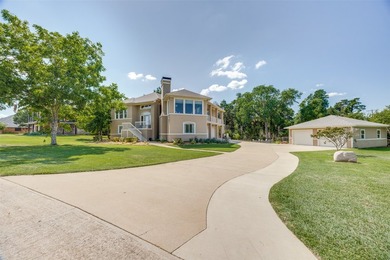 Perched above the shores of Lake Texoma, this stunning modern - photo 3