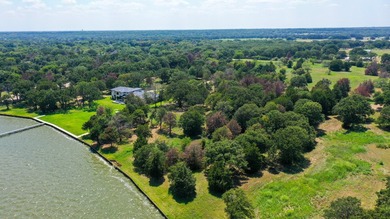 Almost 2 acre waterfront lot with mature trees and miles of view - photo 8