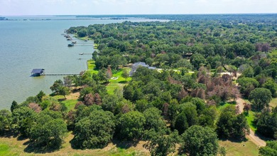 Almost 2 acre waterfront lot with mature trees and miles of view - photo 9