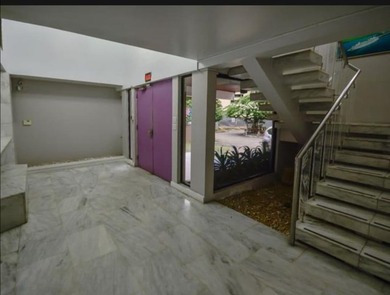 Corner lot with house in Marbella - Zoned RM3/C2 - Leased - photo 3