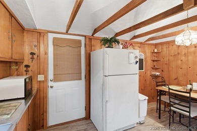 Discover this unique 2-bedroom, 1-bath lakefront cabin offering - photo 10
