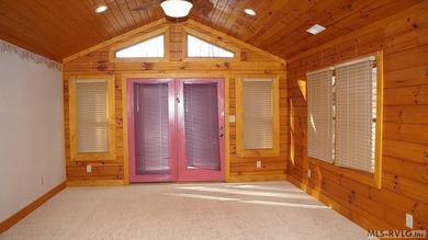 Discover the charm of this stunning log cabin home, which offers - photo 12