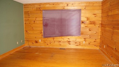Discover the charm of this stunning log cabin home, which offers - photo 16