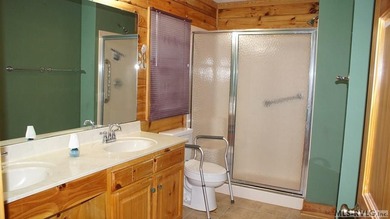 Discover the charm of this stunning log cabin home, which offers - photo 17