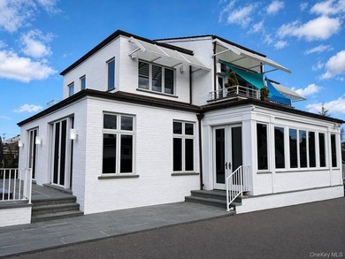 Rebuilt in 2004, this stunning residence sits on an oversized 7 - photo 3