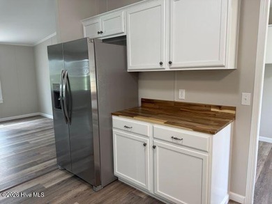 This beautifully updated 3-bedroom, 2-bath manufactured home is - photo 9