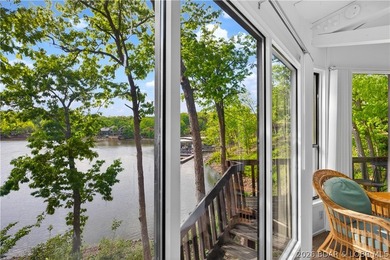 Enjoy treehouse-style living with true lakefront views and all - photo 2