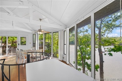 Enjoy treehouse-style living with true lakefront views and all - photo 9