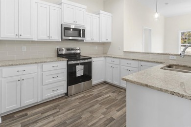 Beautiful new construction 4-bedroom, 2-bath brick home in the - photo 11