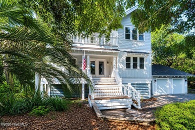 Golf course living wrapped in maritime forest privacy. Nestled - photo 1