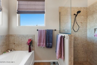 This is the perfect combination of a beautiful custom home AND