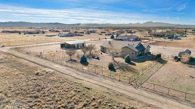 This is the perfect combination of a beautiful custom home AND