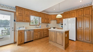 Wonderful lake view from this Gravois home. Original owner is - photo 6