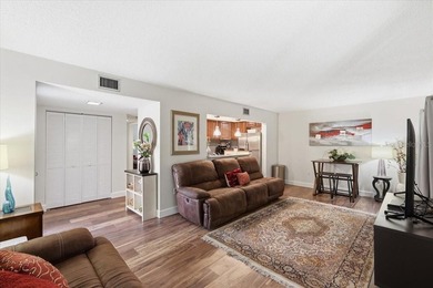 REDUCED:   Welcome to a highly sought after ground floor unit - photo 7