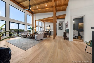 Contemporary luxury meets effortless lake living in this - photo 9