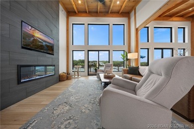 Contemporary luxury meets effortless lake living in this - photo 10