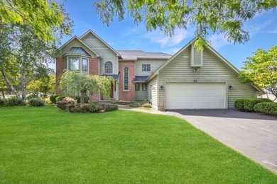 Set on nearly half an acre, this 2 story brick-front Colonial - photo 1