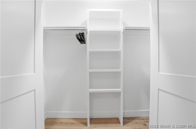 Experience unparalleled lakeside luxury in this fully remodeled - photo 1