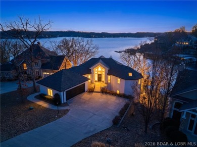 Experience unparalleled lakeside luxury in this fully remodeled - photo 2