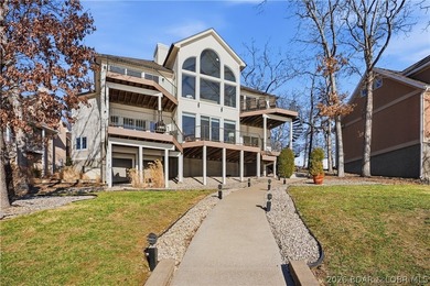 Experience unparalleled lakeside luxury in this fully remodeled - photo 3
