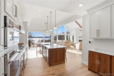 Experience unparalleled lakeside luxury in this fully remodeled - photo 10