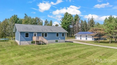Lake Home For Sale in Rapid River, Michigan